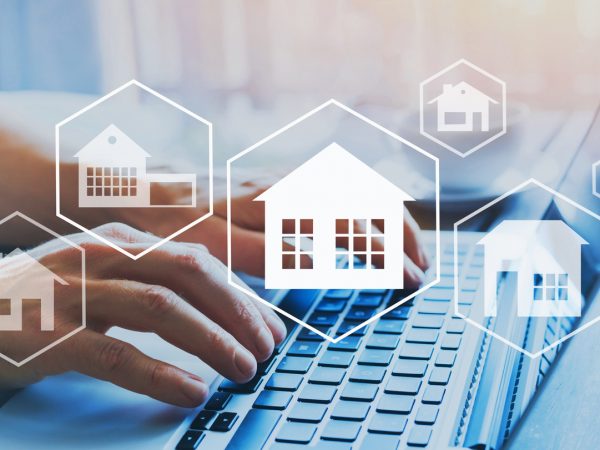 buy house, real estate concept, different offers of property online, hands typing on computer as background